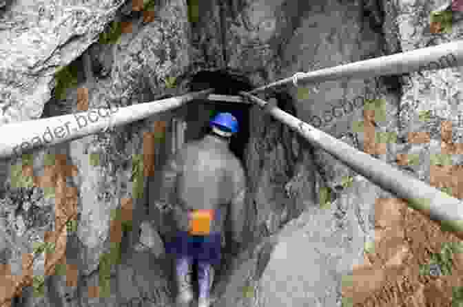 A Bolivian Miner Working In A Narrow Tunnel With Rudimentary Tools, Navigating Treacherous Conditions. The Sacrifice: How Bolivian Miners Extract Their Wealth