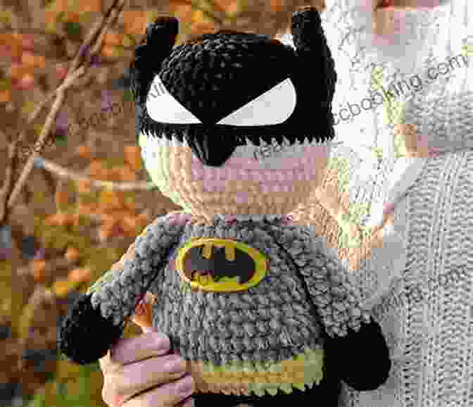 Crochet Batman Pattern Cover With Batman Figure Emerging From A Bat Symbol Made Of Yarn Crochet Batman Pattern