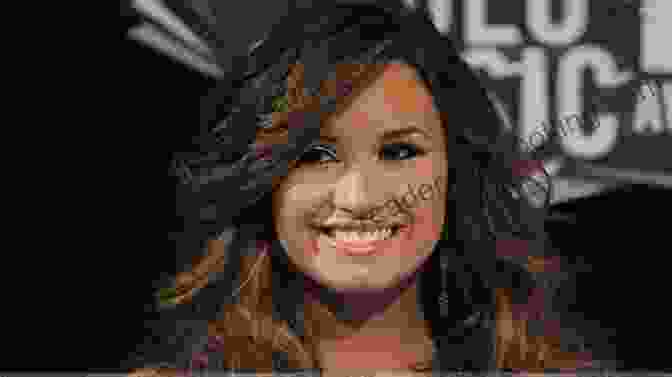Demi Lovato Smiling And Looking Into The Camera FAME: Demi Lovato