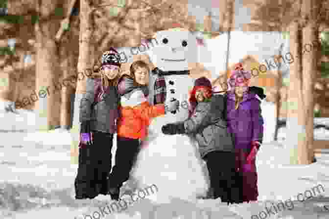 Ellray Jakes And A Group Of Children Building A Snowman EllRay Jakes Rocks The Holidays