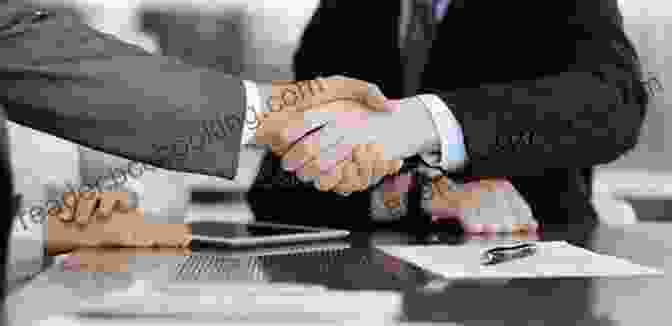 Negotiators Shaking Hands After Reaching An Agreement ng Business At The Table: Present Exemplary Professional And Social Presence And Host A Successful Lunch Or Business Meeting