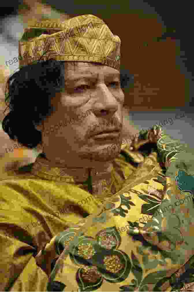 Portrait Of Muammar Qaddafi, Wearing A Traditional Libyan Robe And Hat Muammar Qaddafi (People In The News)
