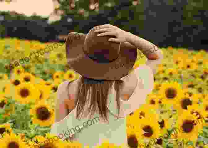 Smiling Woman Wearing The Crochet Sunflower Petal Hat In A Field Of Sunflowers CROCHET PATTERN PDF Giant Sunflower Petal Hat
